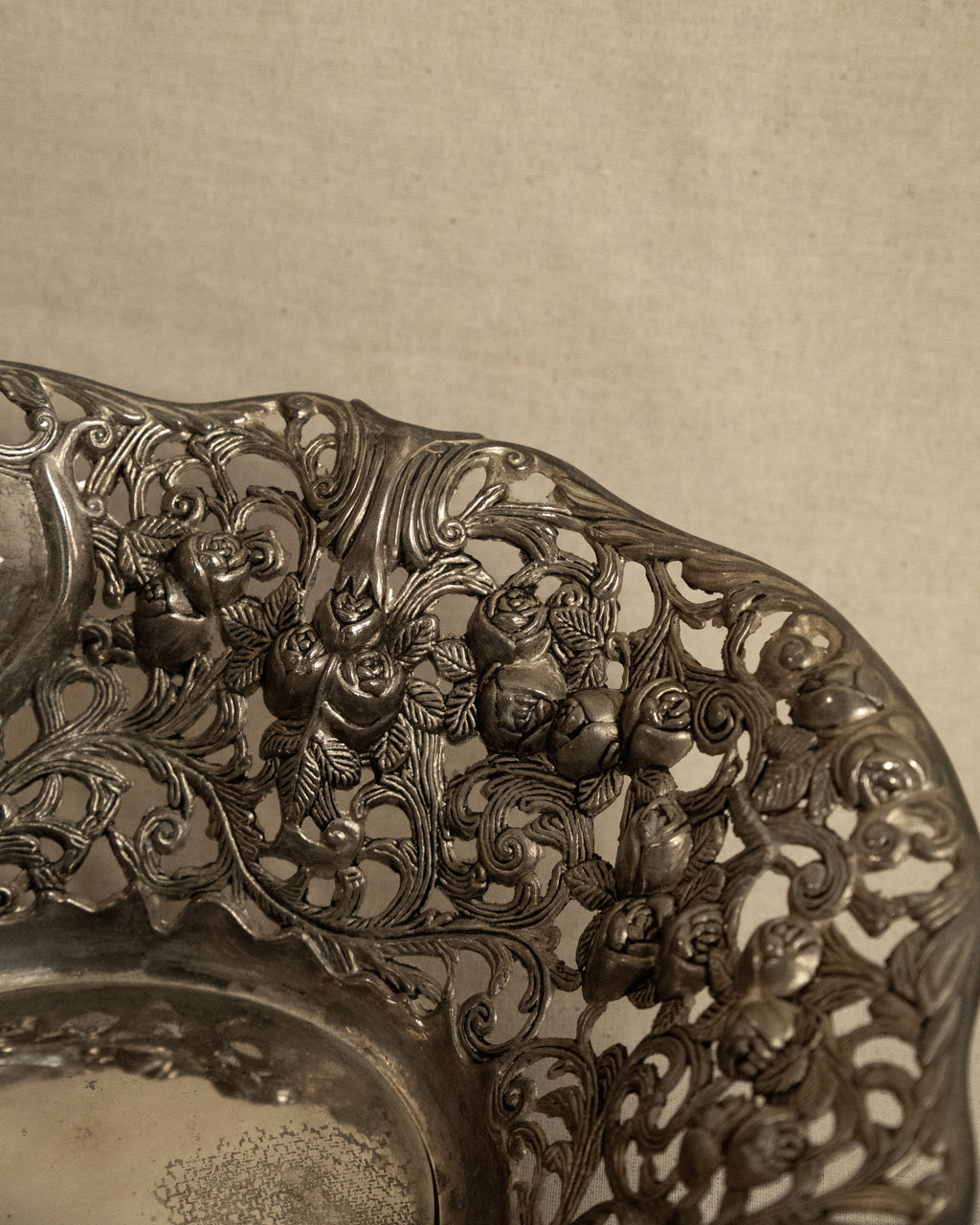 Pair of silver finish bowls with rose details
