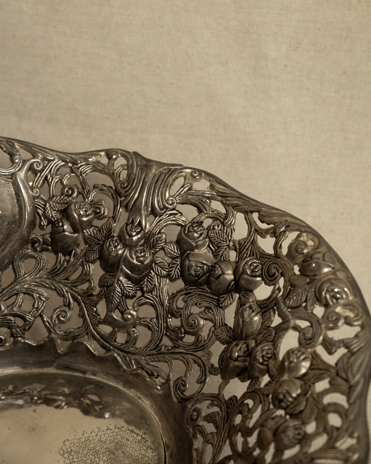 Pair of silver finish bowls with rose details