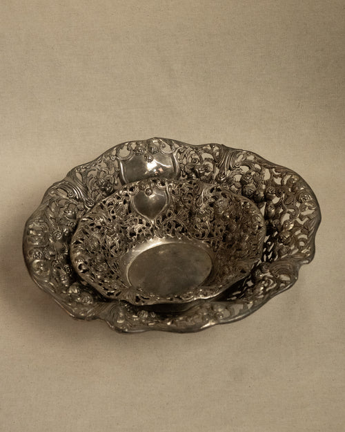 Pair of silver finish bowls with rose details