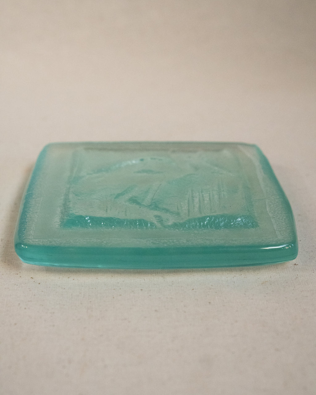 Ibis tinted green embossed glass dish
