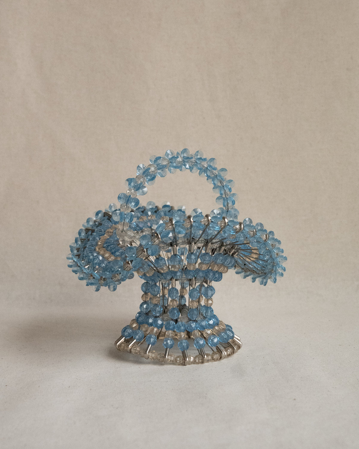 Beaded basket assembled using safety pins