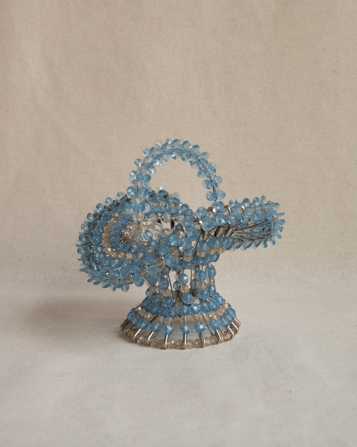 Beaded basket assembled using safety pins