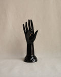 Black ceramic hand sculpture and jewellery stand