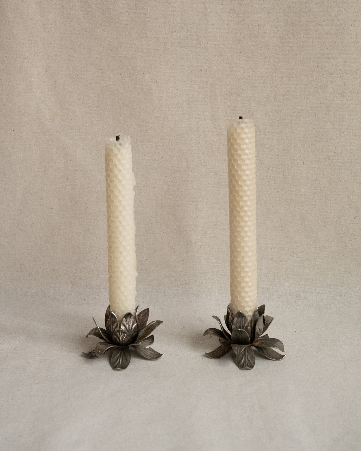 Pair of silver finish floral metal candle holders