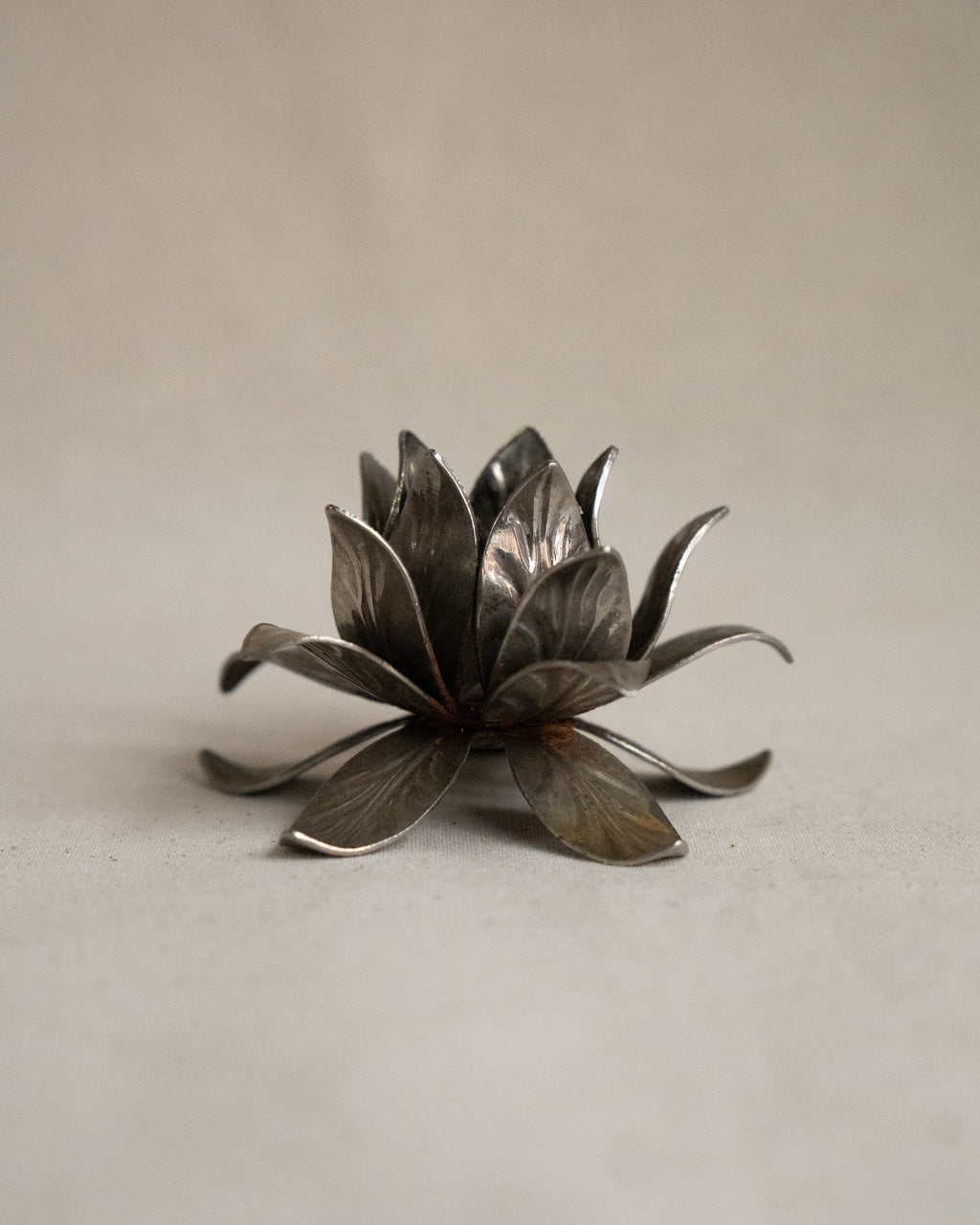 Pair of silver finish floral metal candle holders