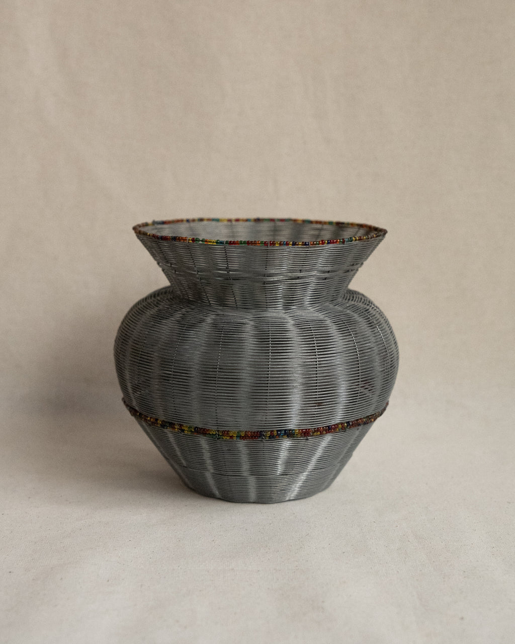 Fine wire vessel with colourful beads
