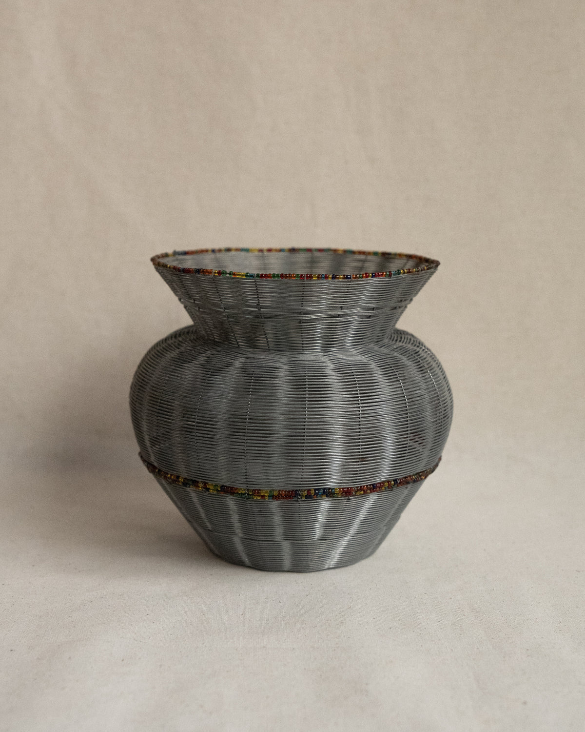 Fine wire vessel with colourful beads
