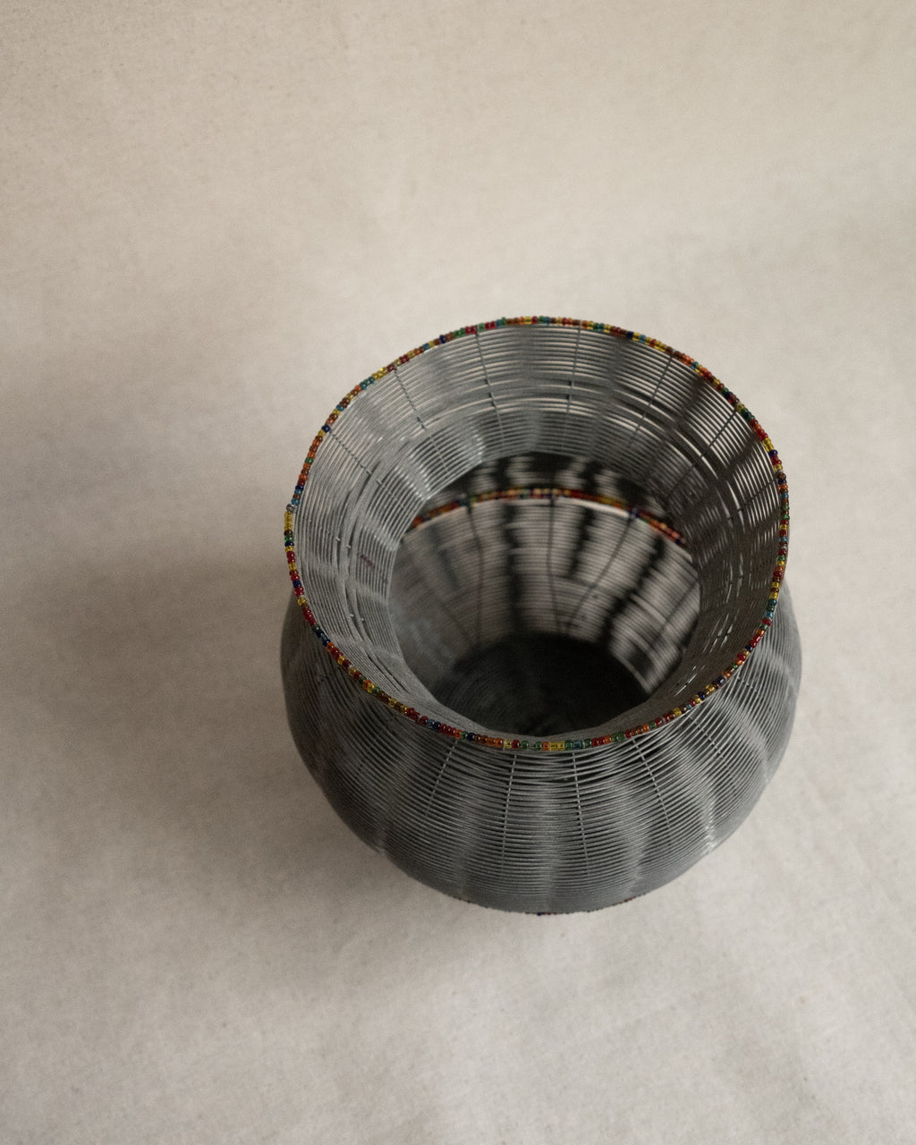 Fine wire vessel with colourful beads