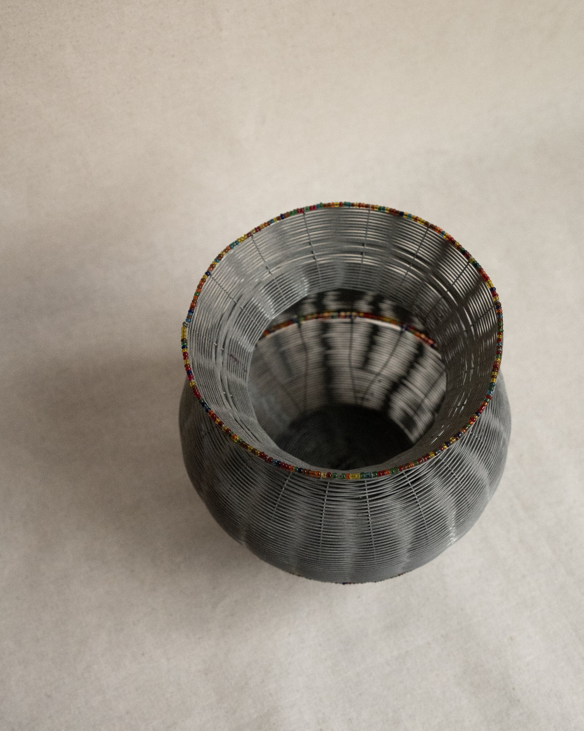 Fine wire vessel with colourful beads
