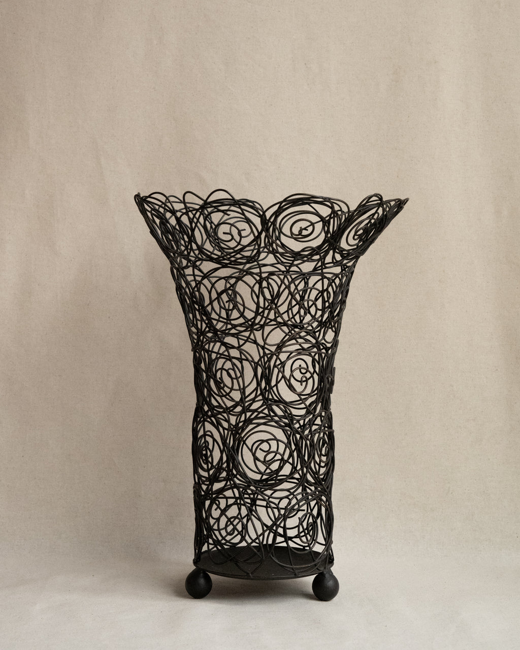 Wire art of roses vessel