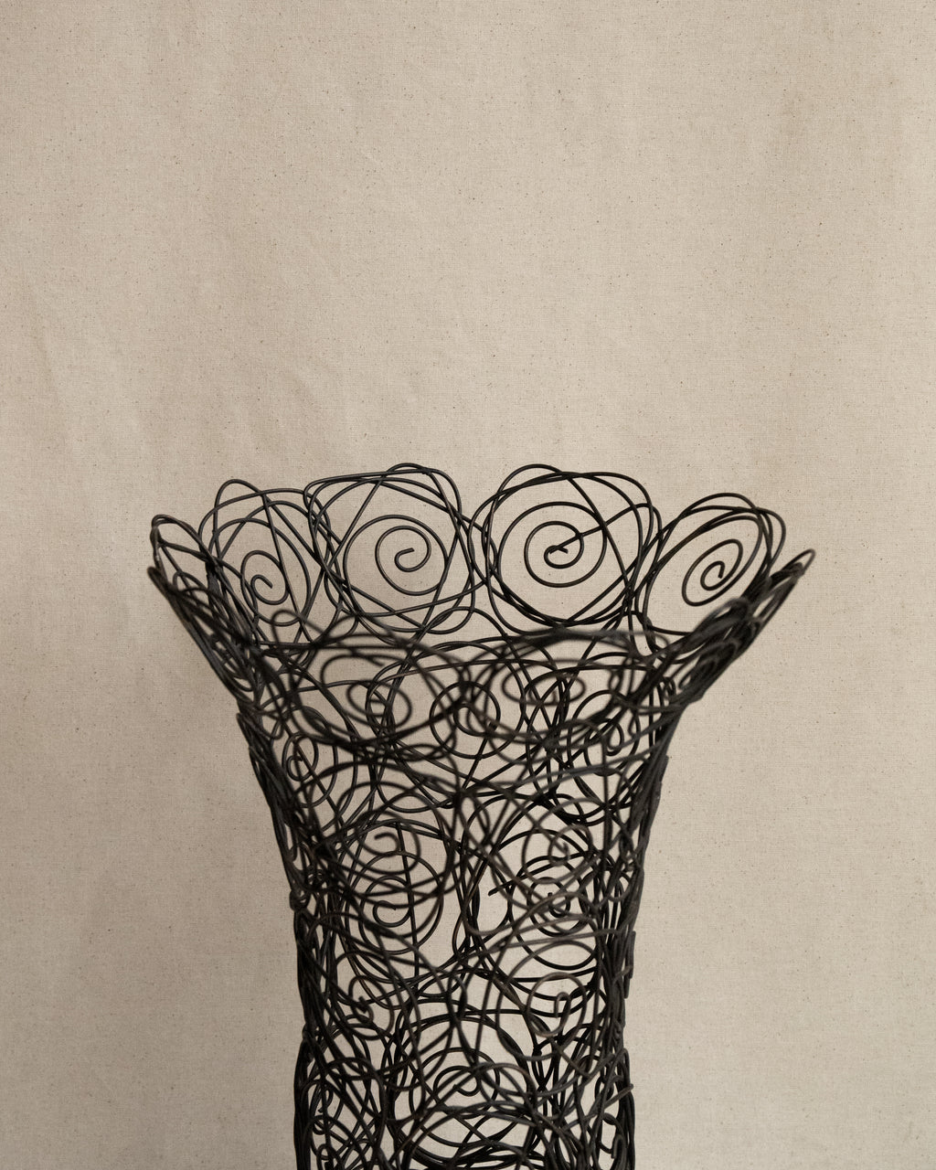 Wire art of roses vessel