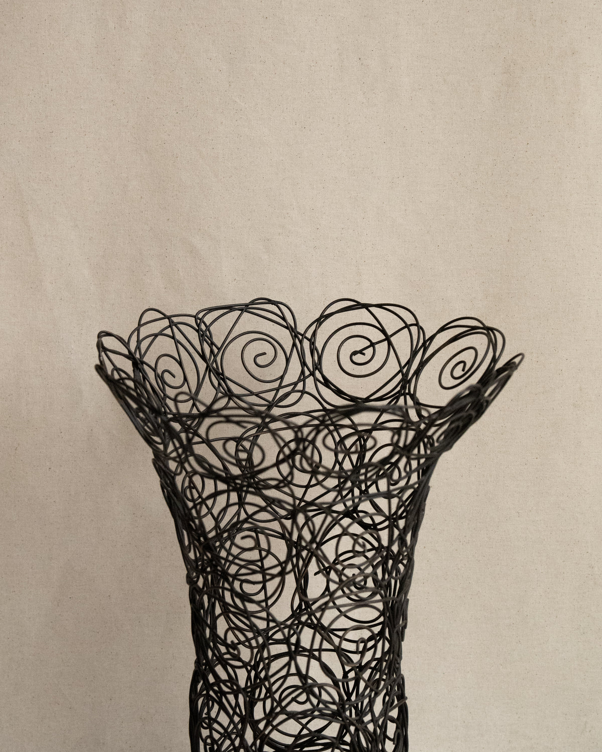 Wire art of roses vessel