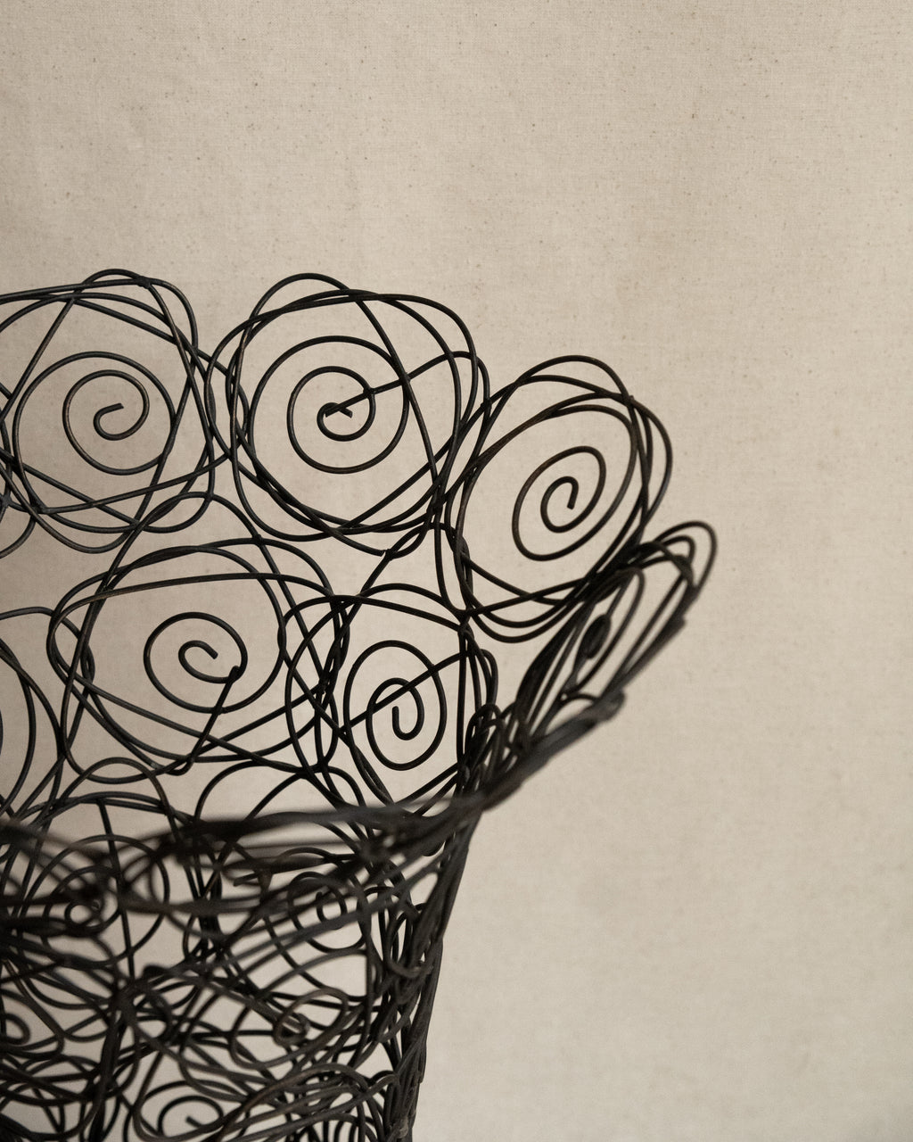 Wire art of roses vessel