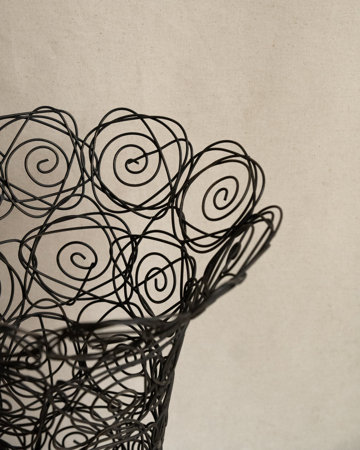 Wire art of roses vessel