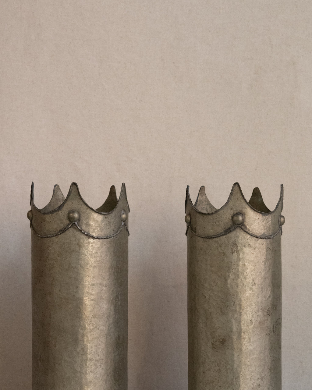 Hammered metal wine bottle holder/vase with crown detail