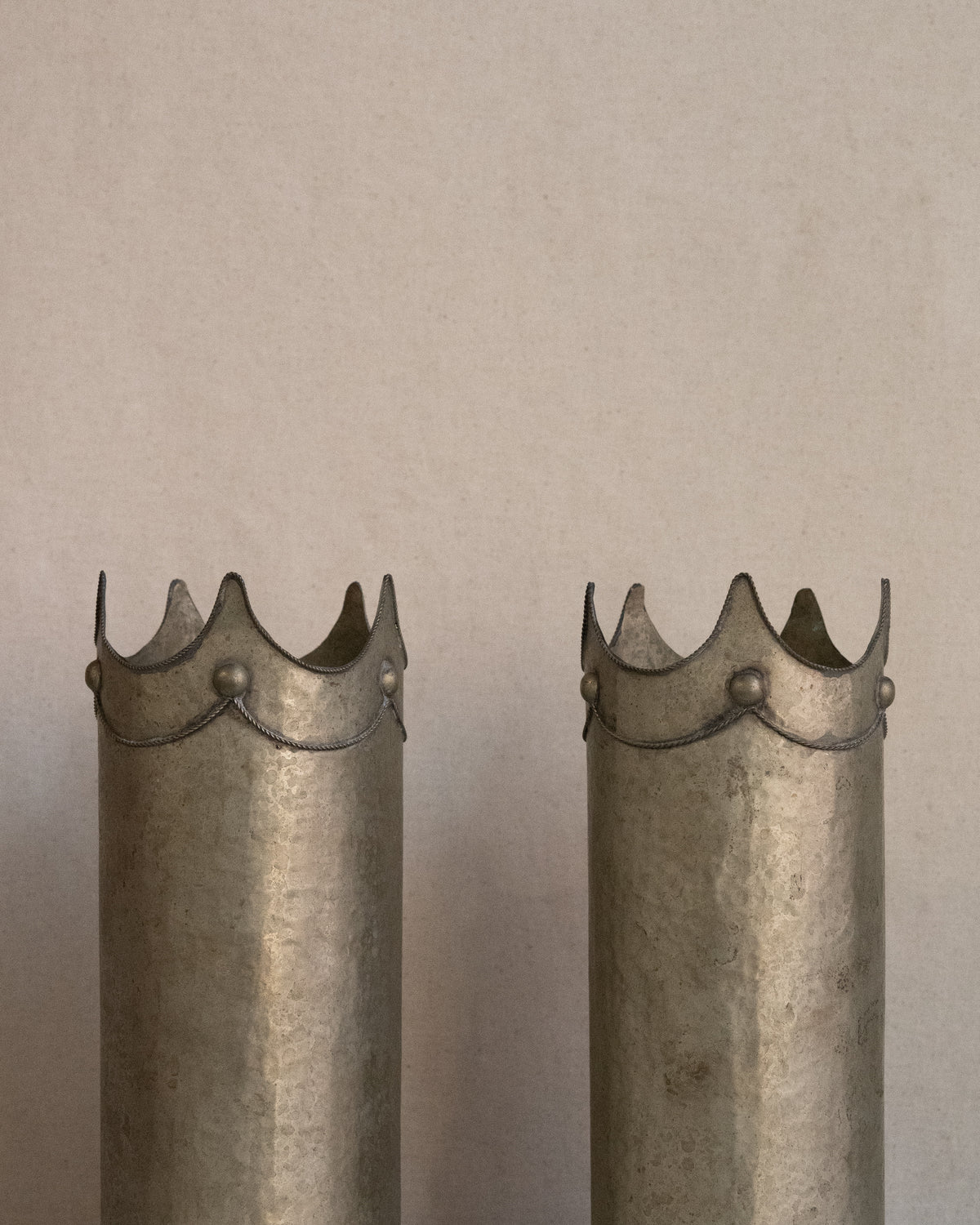 Hammered metal wine bottle holder/vase with crown detail