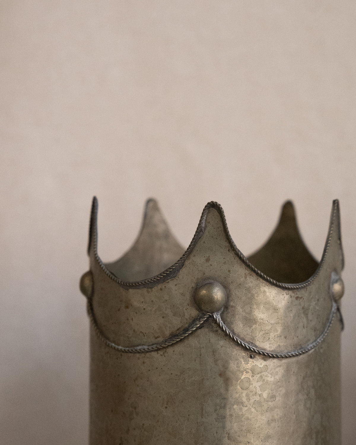 Hammered metal wine bottle holder/vase with crown detail