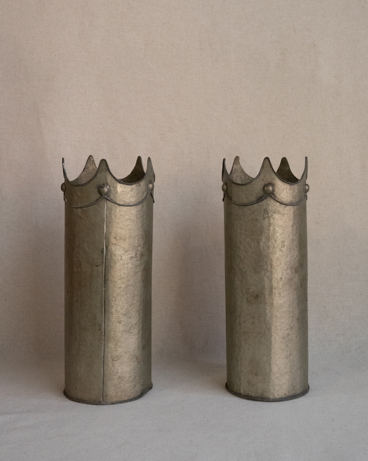 Hammered metal wine bottle holder/vase with crown detail