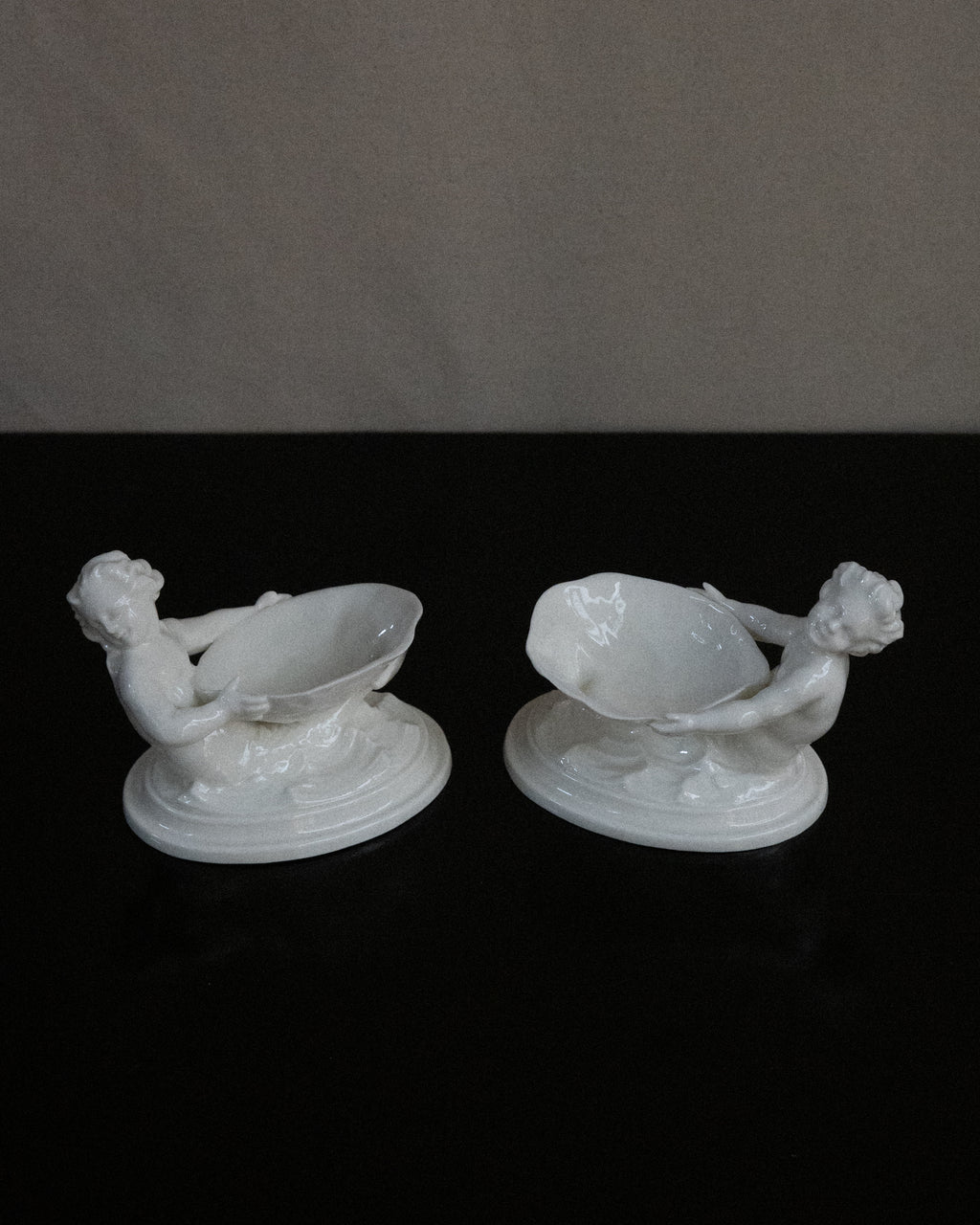 Pair of merman and mermaid on waves salt dishes, Made in England