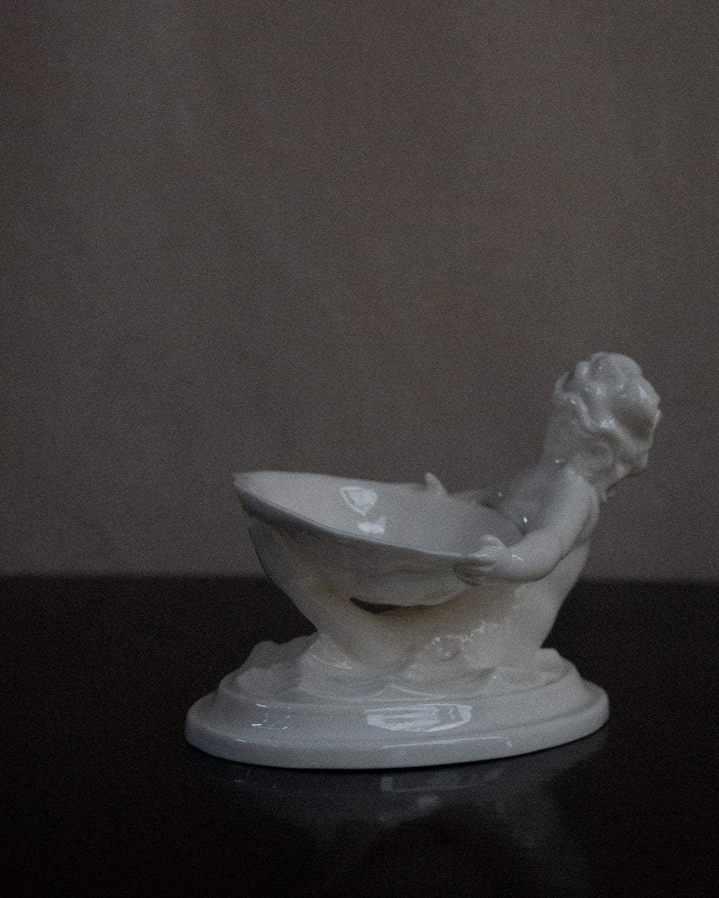 Pair of merman and mermaid on waves salt dishes, Made in England