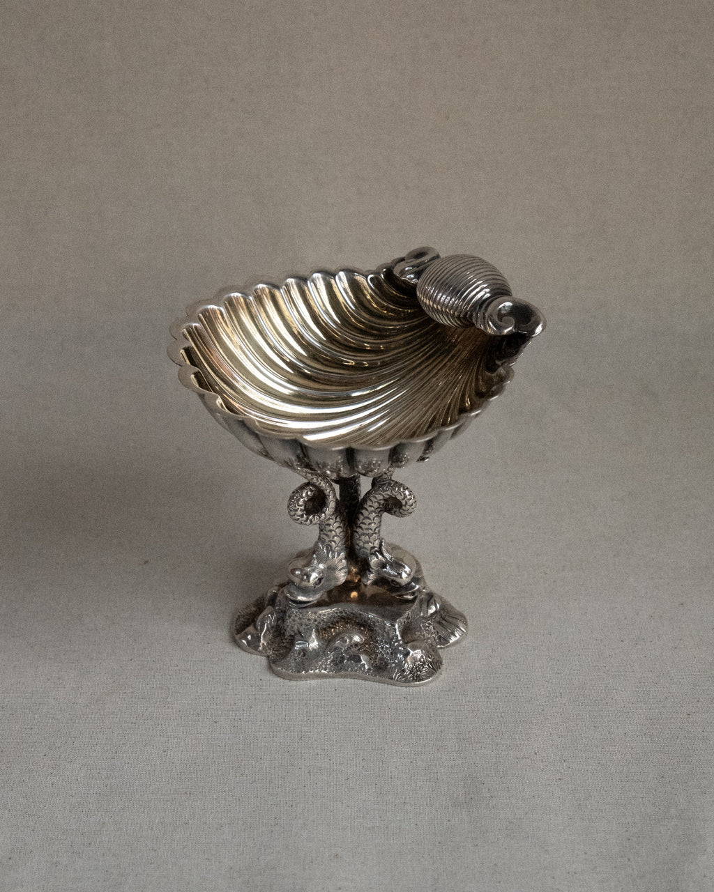 Silver plated shell dish with dolphins