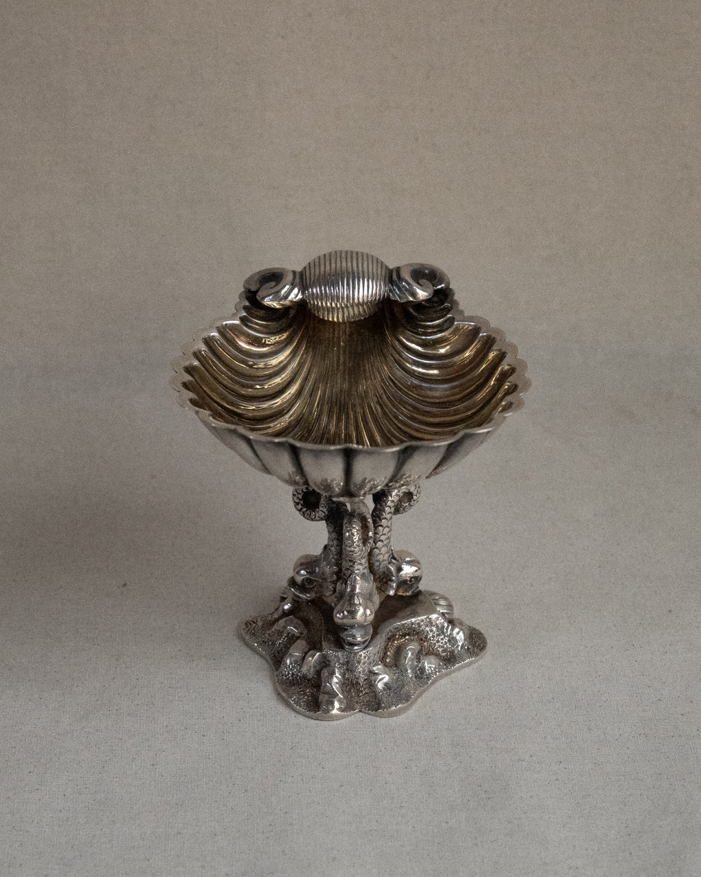 Silver plated shell dish with dolphins