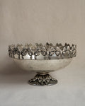 Metal raised bowl with bow details in silver-brass finish