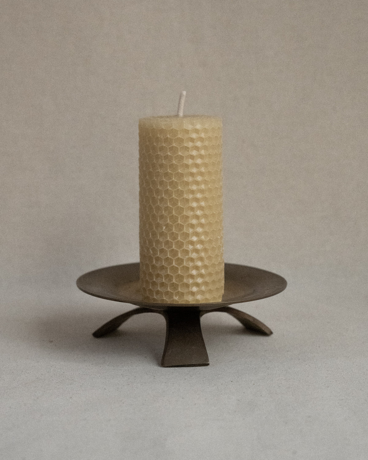Brass pillar candle holder
