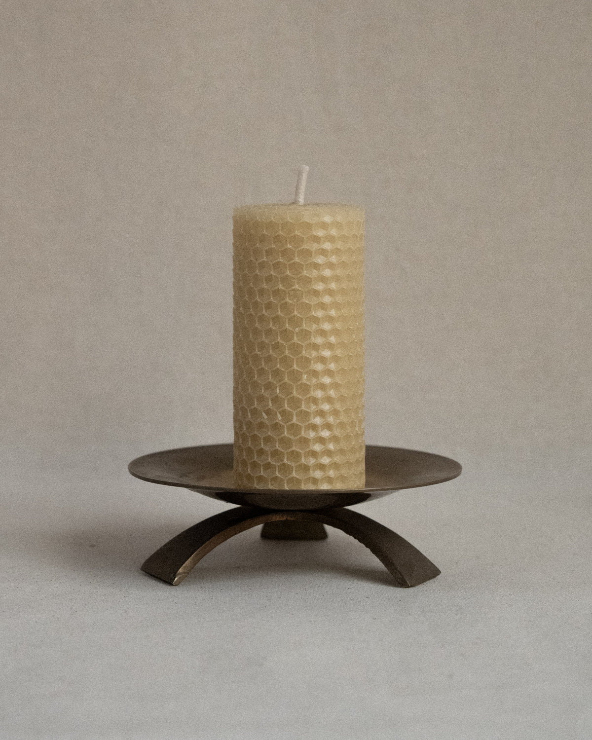 Brass pillar candle holder