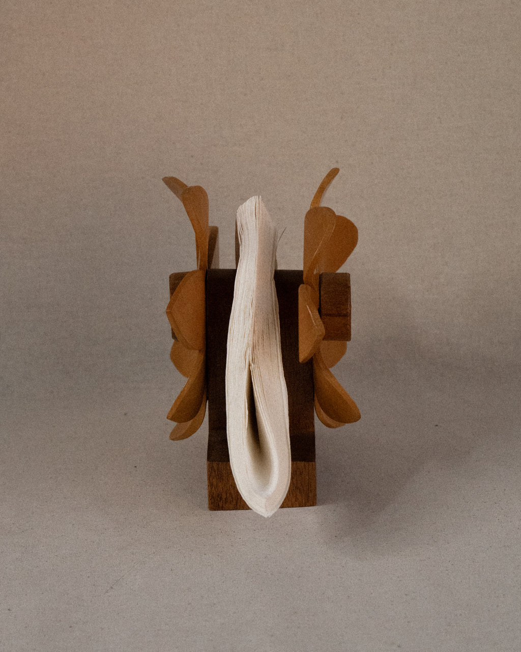 Dual sided carved wooden sunflower napkin holder