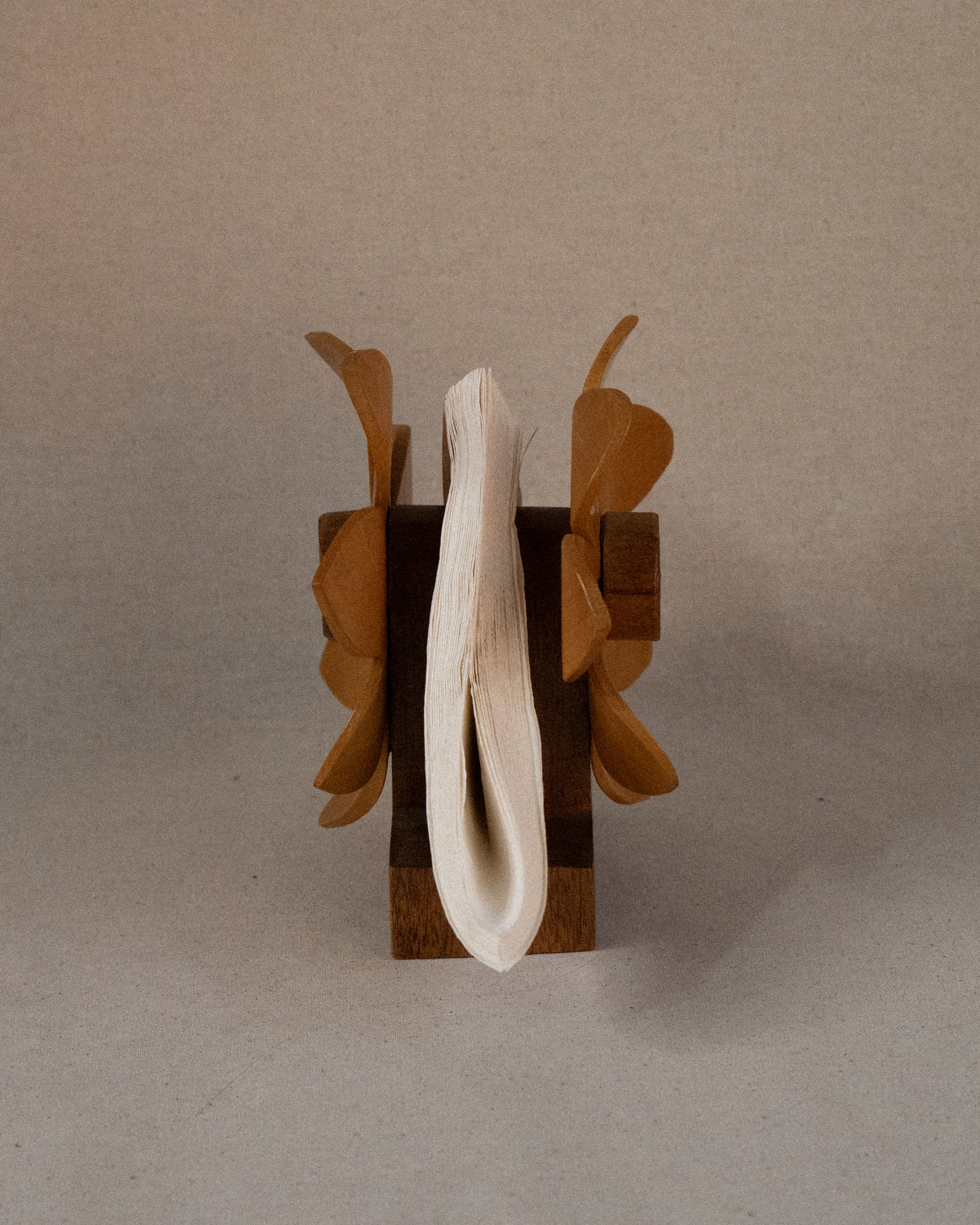 Dual sided carved wooden sunflower napkin holder