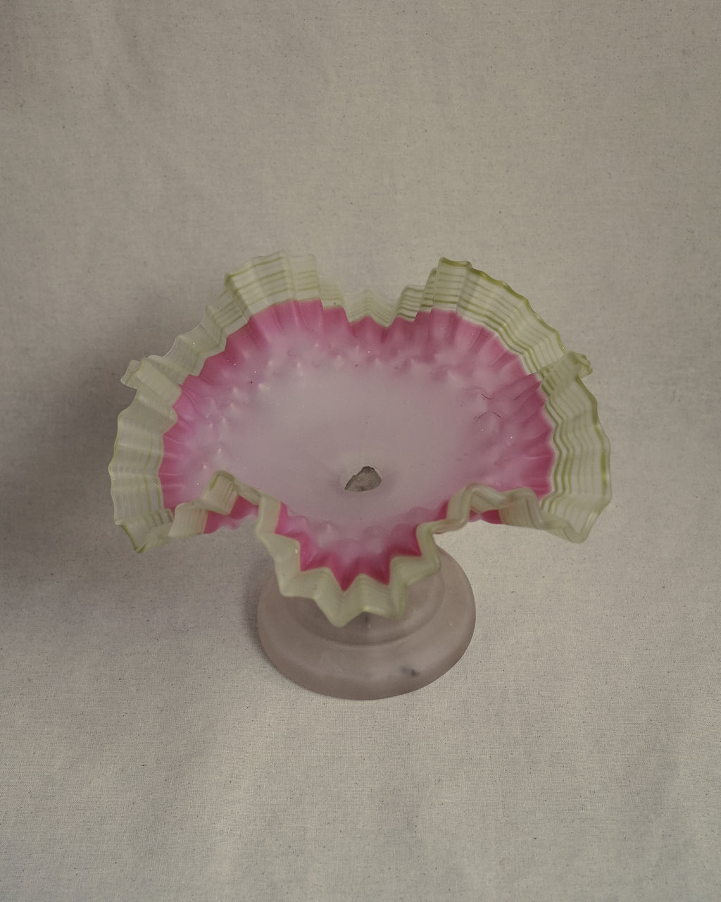 Late 19th century victorian opalescent art glass pedestal compote with pink and yellow/green art glass ruffled edges