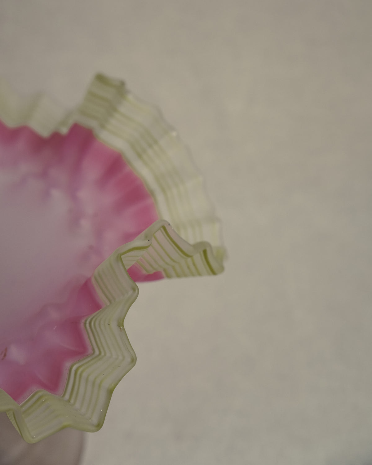 Late 19th century victorian opalescent art glass pedestal compote with pink and yellow/green art glass ruffled edges