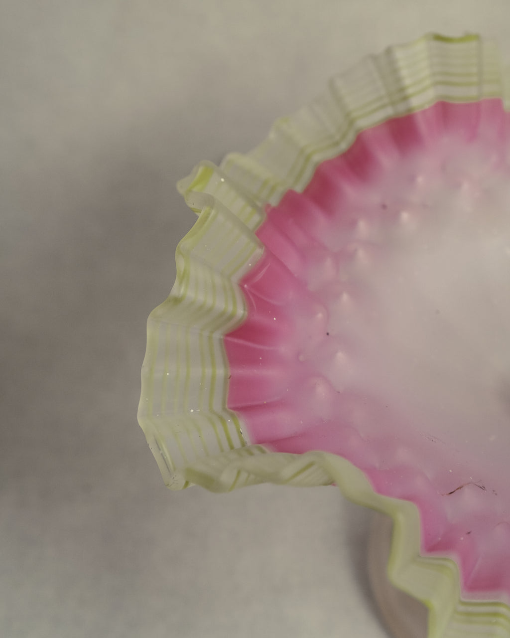 Late 19th century victorian opalescent art glass pedestal compote with pink and yellow/green art glass ruffled edges