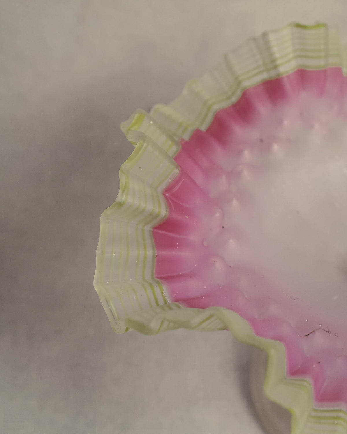 Late 19th century victorian opalescent art glass pedestal compote with pink and yellow/green art glass ruffled edges