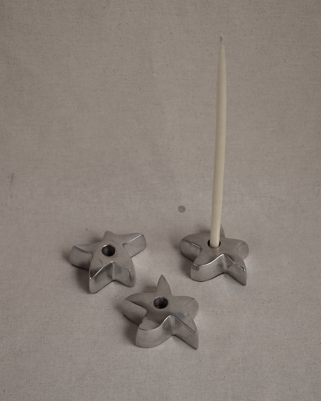 Star aluminum candle holder