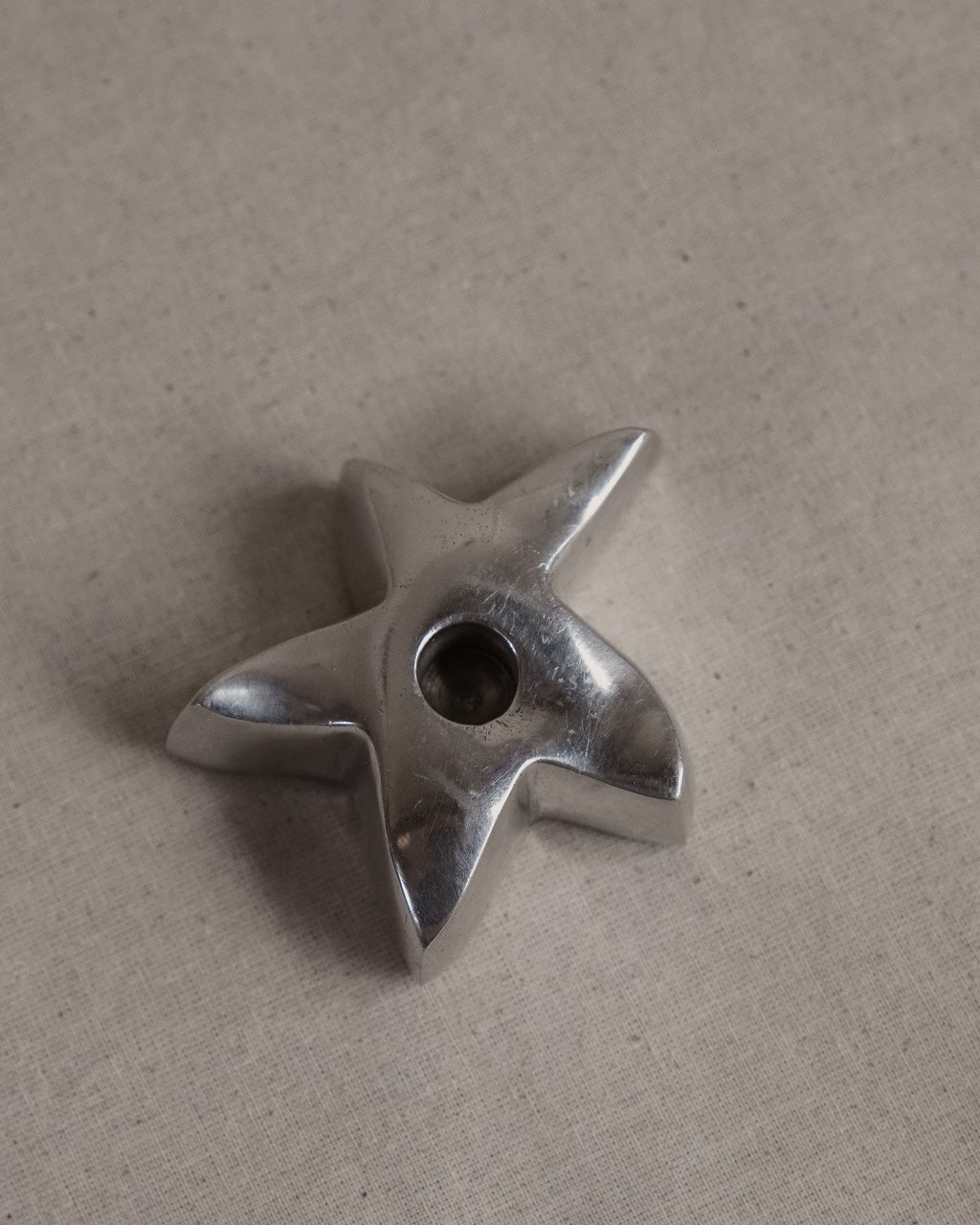 Star aluminum candle holder