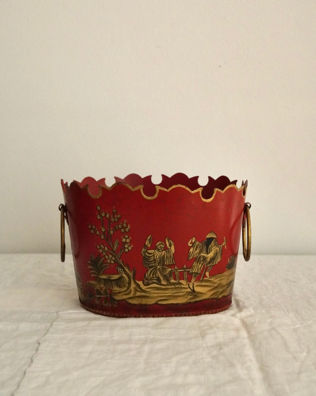 Chinese artwork on red background metal basket with handles