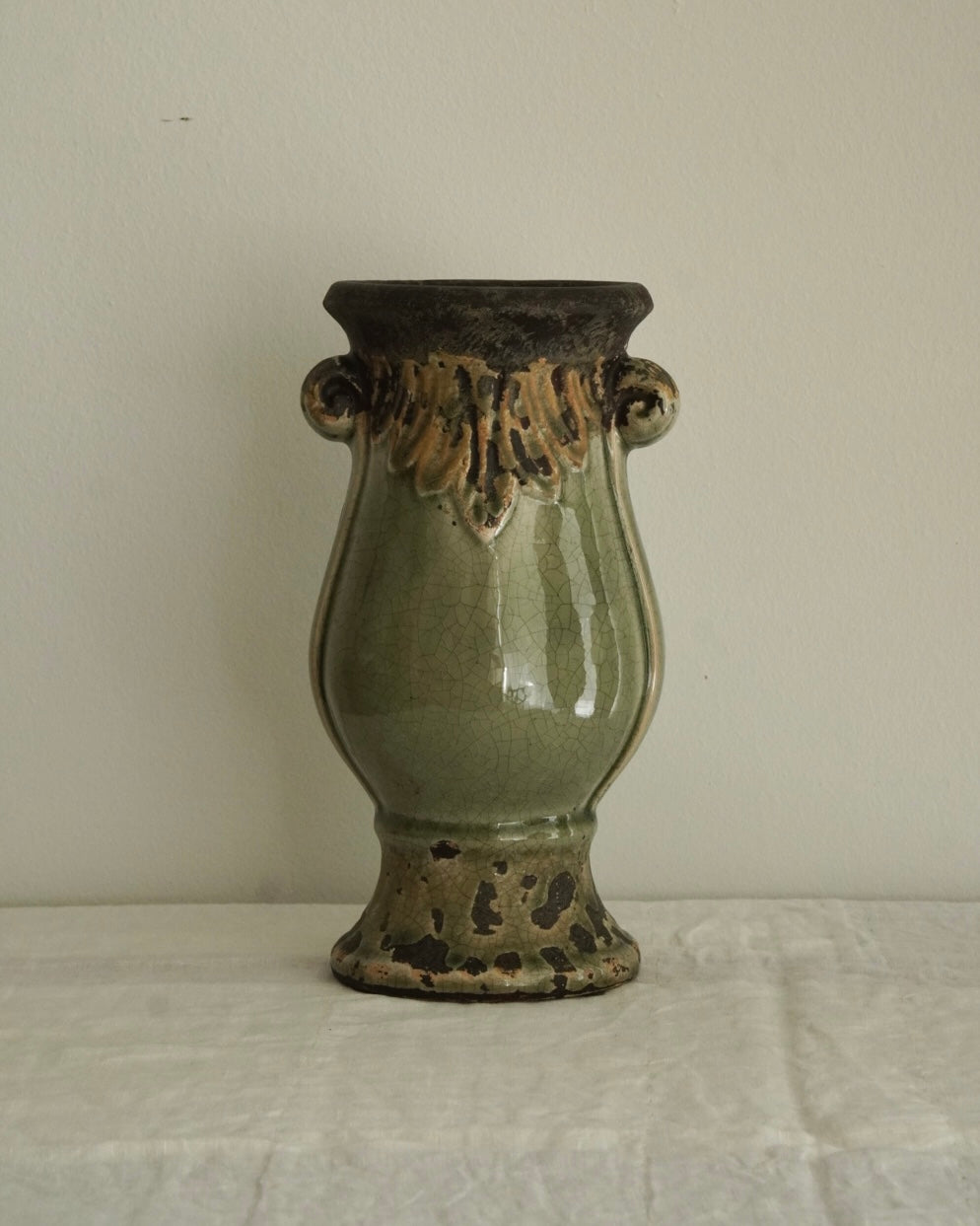 Light green and grey ceramic vase with scroll handles