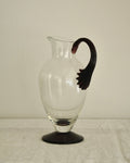 Glass pitcher vase with star like dark purple handle