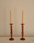 Pair of wooden candle holders