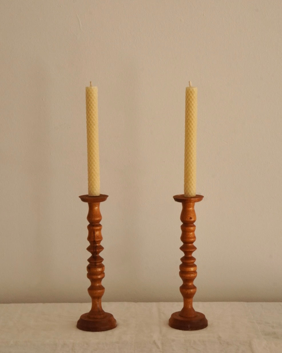 Pair of wooden candle holders