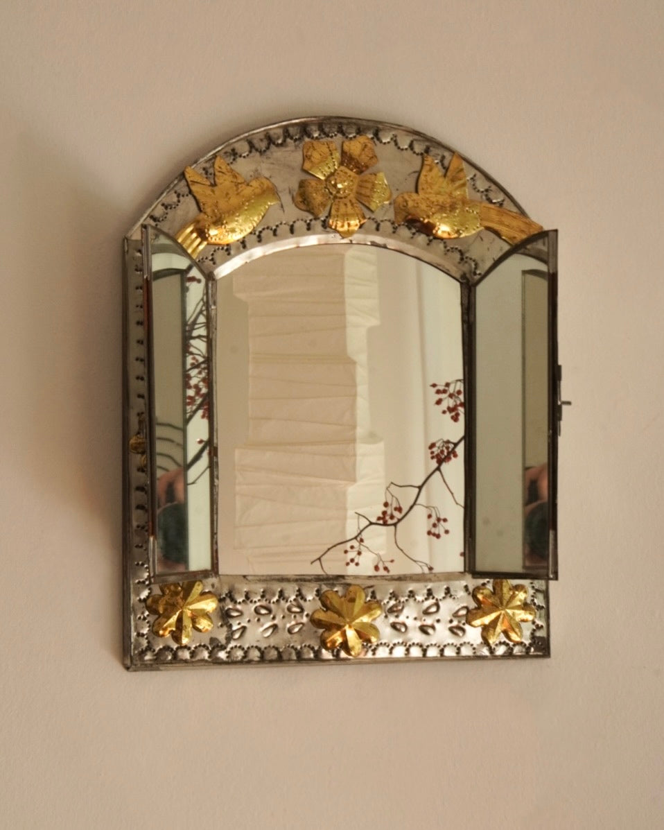 Mexican 1980s folk punched tin wall mirror with doors and bird flower motifs