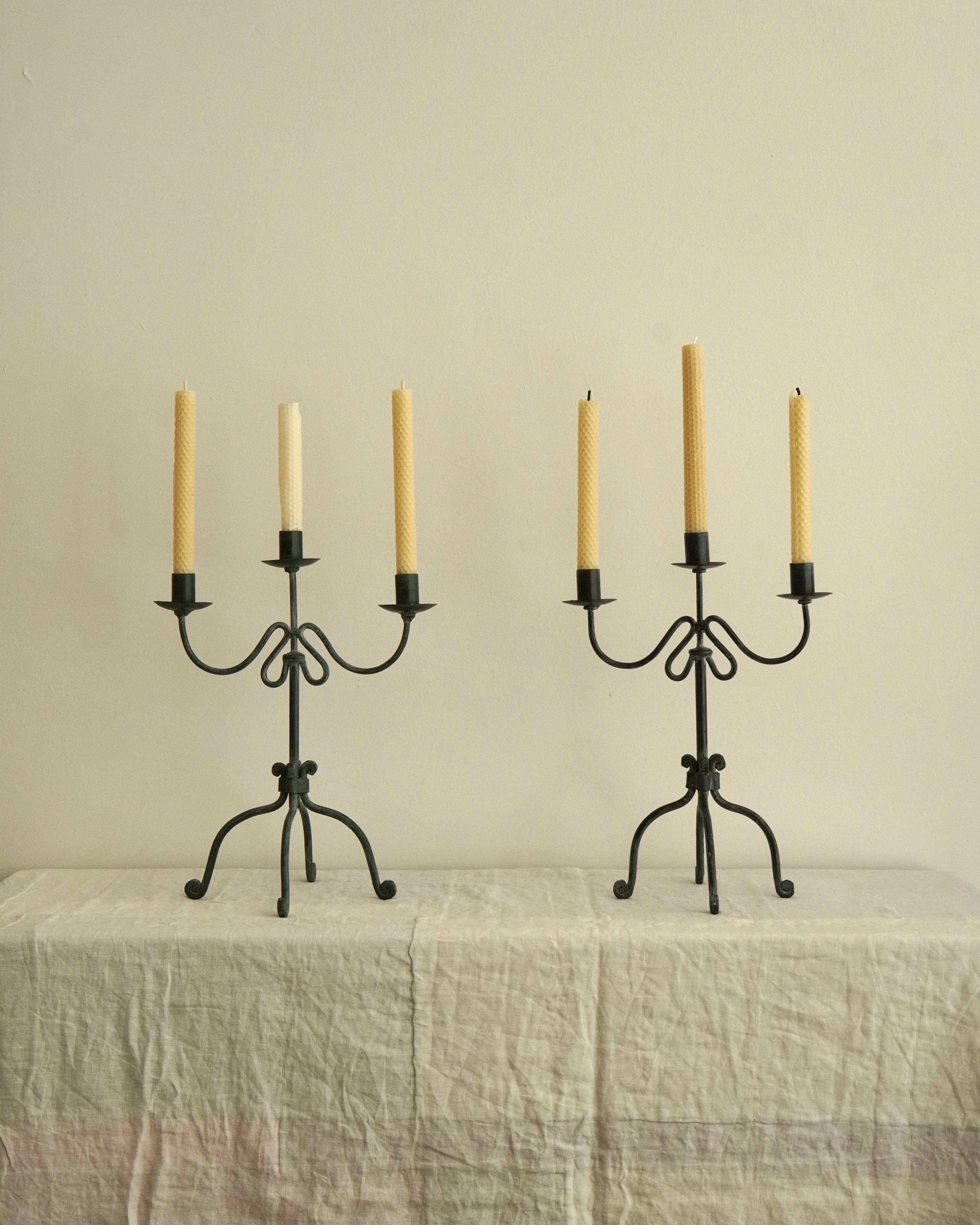Pair of wrought iron candle holders