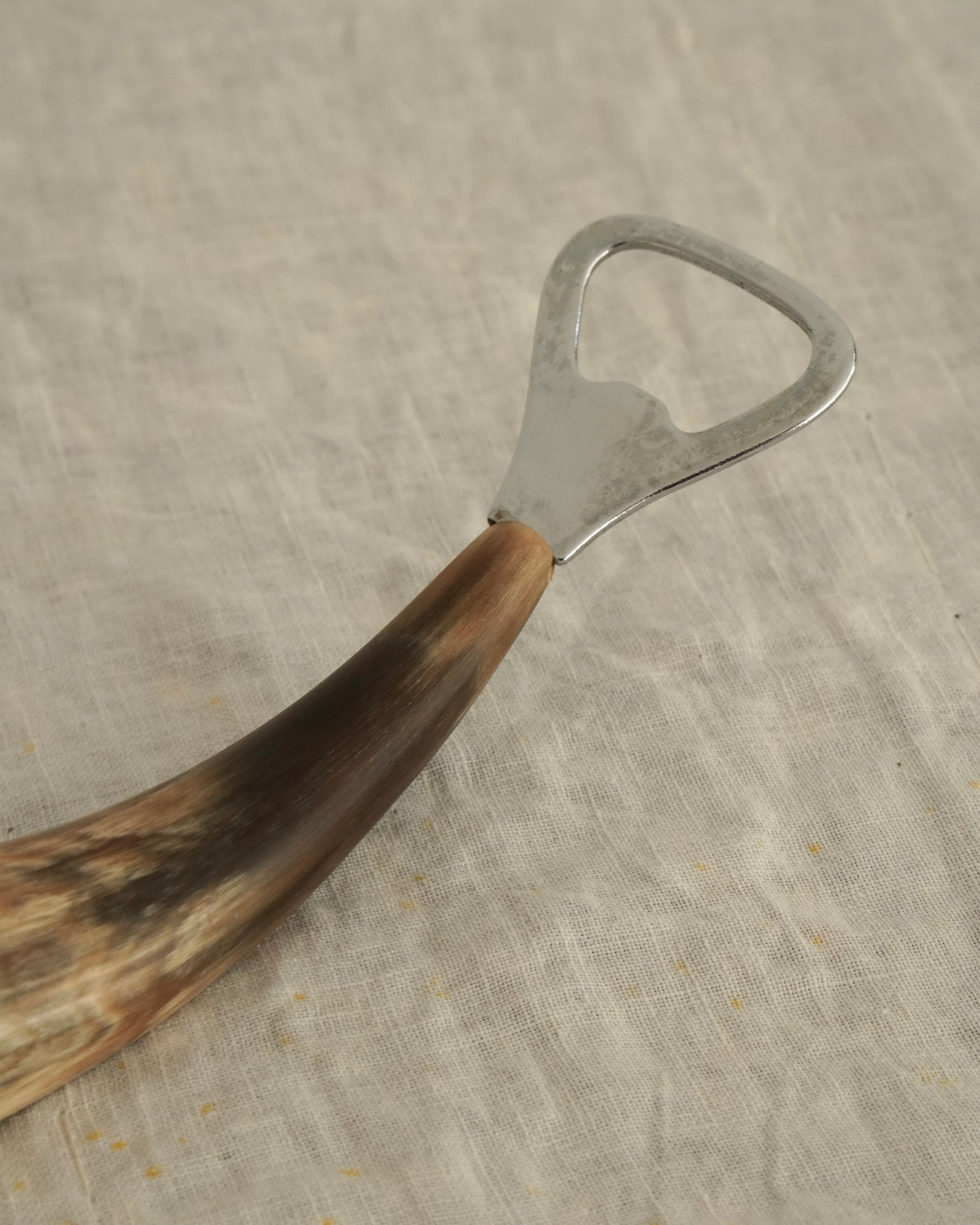 Whale bottle opener made of horn