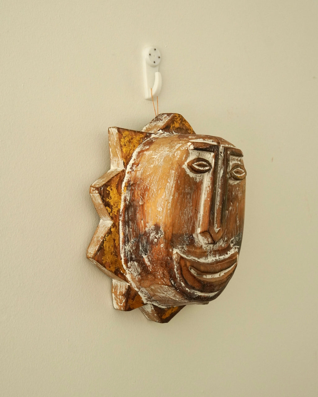 Carved wooden sun smiley face wall hanging