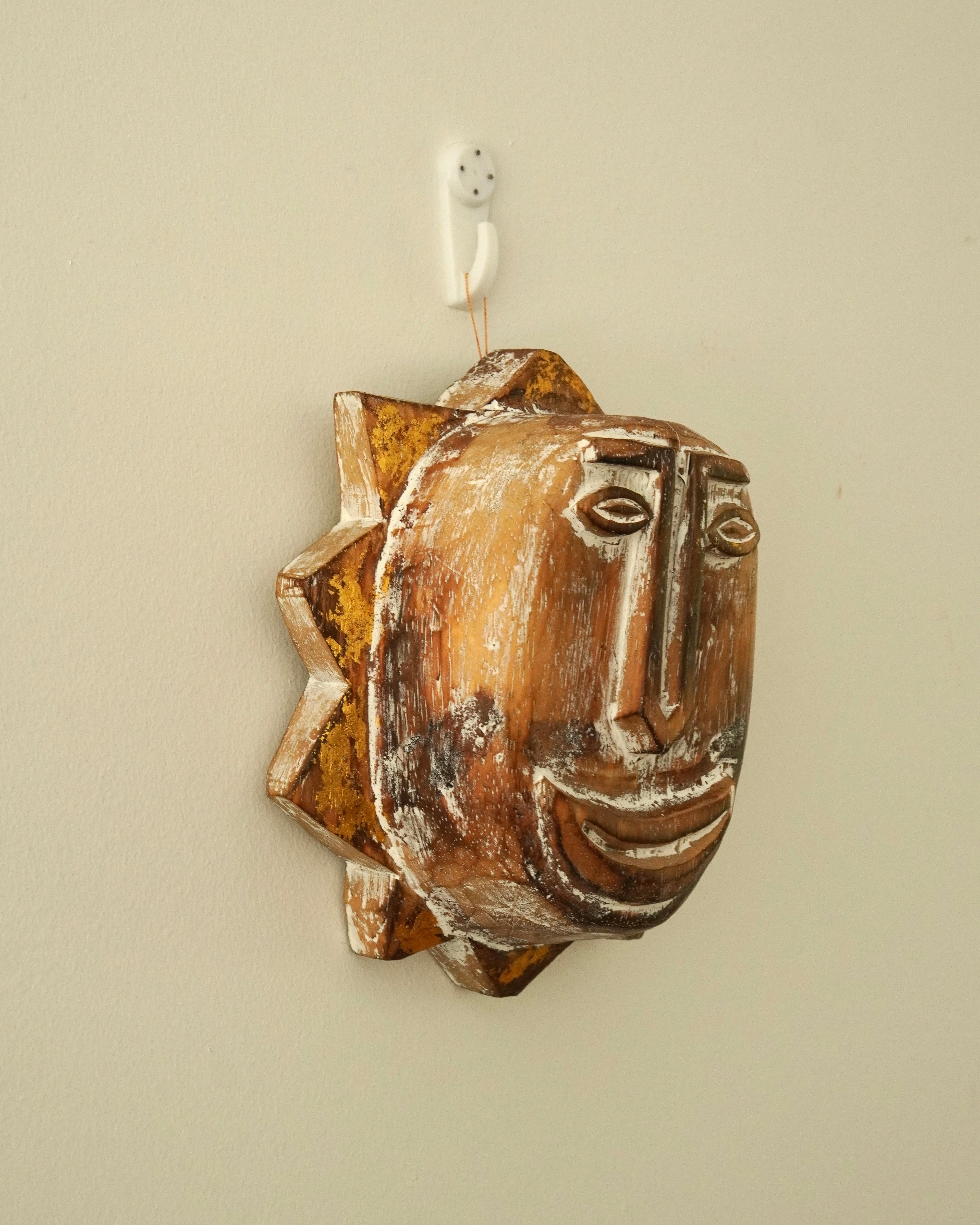 Carved wooden sun smiley face wall hanging