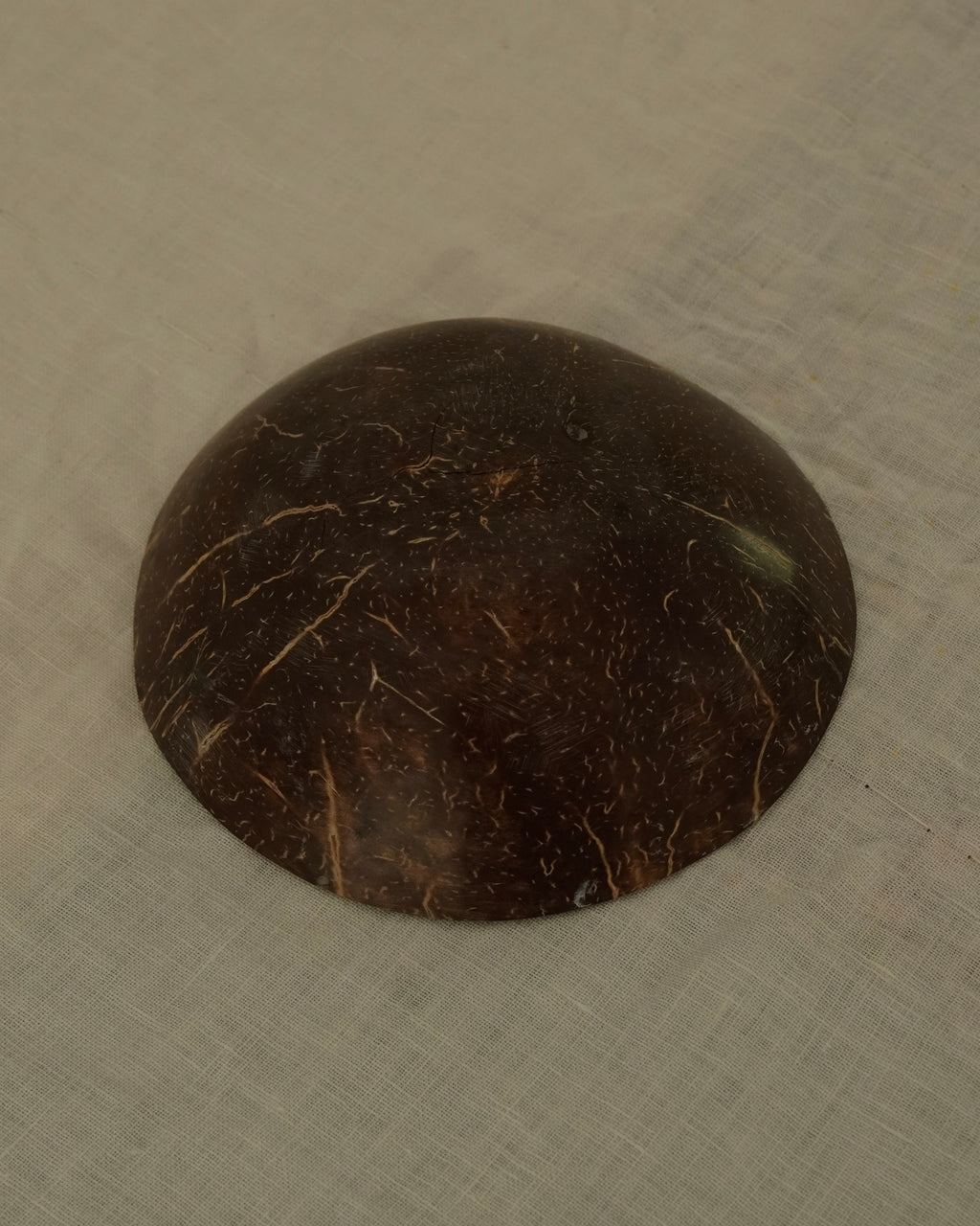 Coconut shell trinket bowl with spiral motif and mother of pearl inlay