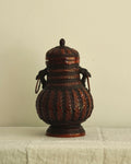 Woven basket with lid, carved wood bird handles and copper vase insert