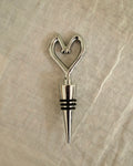 Heart shaped metal and rubber wine stopper